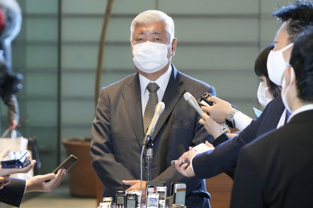 Gen Nakatani speaks to reporters at the PM’s office on November 8, 2021. Photo: Kyodo