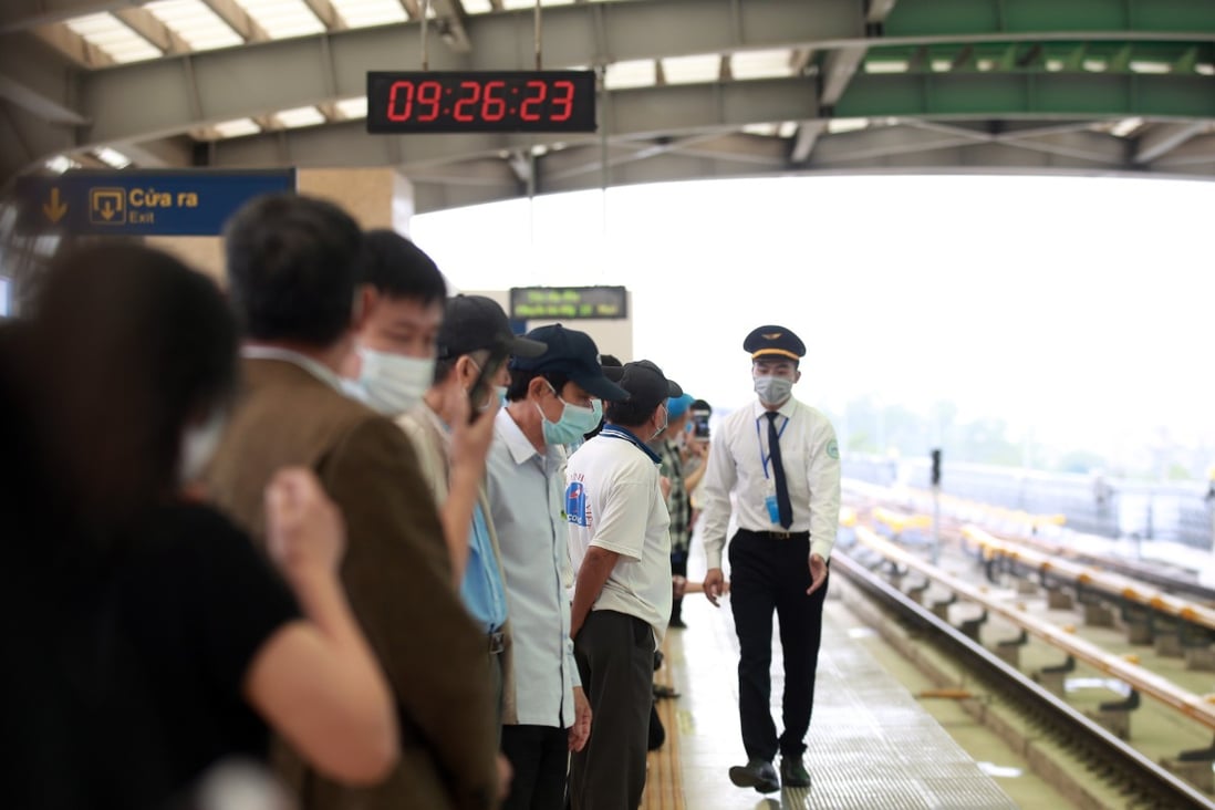 People wait for a train on the Cat Linh-Ha Dong line in Hanoi. Photo: EPA-EFE
