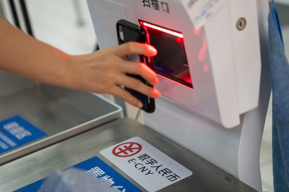 The digital yuan – developed by the central bank and now under trial in a dozen cities – adopts a two-tier structure, where the central bank issues the digital currency to authorised commercial banks, which then exchanges and circulates it to the public. Photo: Bloomberg