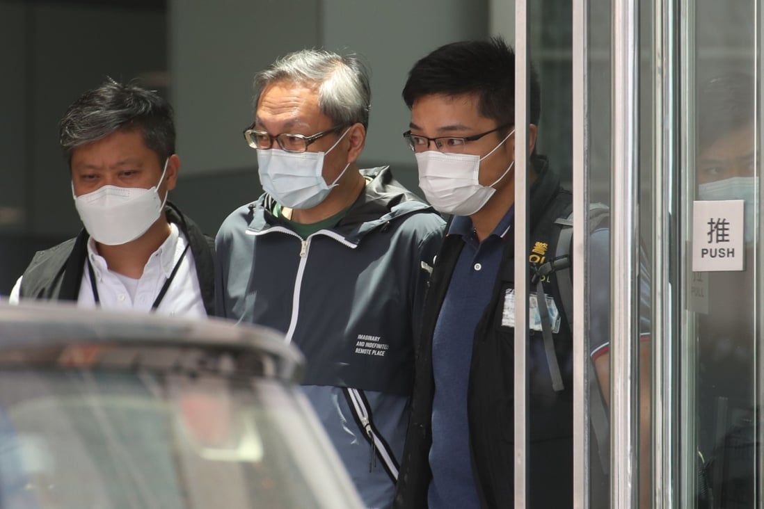 Former Apple Daily publisher Cheung Kim-hung (centre) was denied bail in his national security law trial on Friday. Photo: Winson Wong