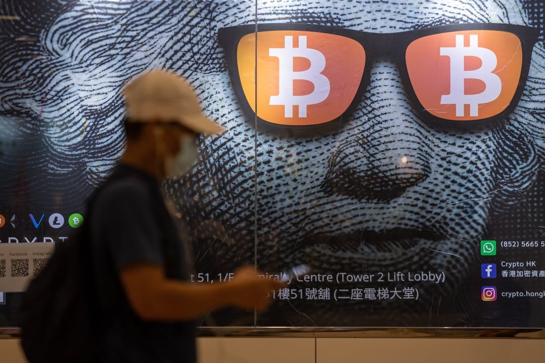 A poster for bitcoin and cryptocurrencies in Hong Kong. OneDegree is one of four virtual insurance licensees in the city tasked with promoting the wider use of insurtech. Photo: EPA-EFE