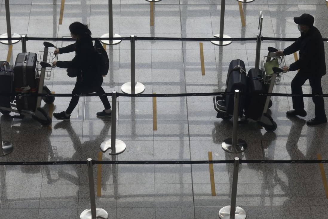 Passengers arrive at Hong Kong International Airport in October. Photo: Xiaomei Chen
