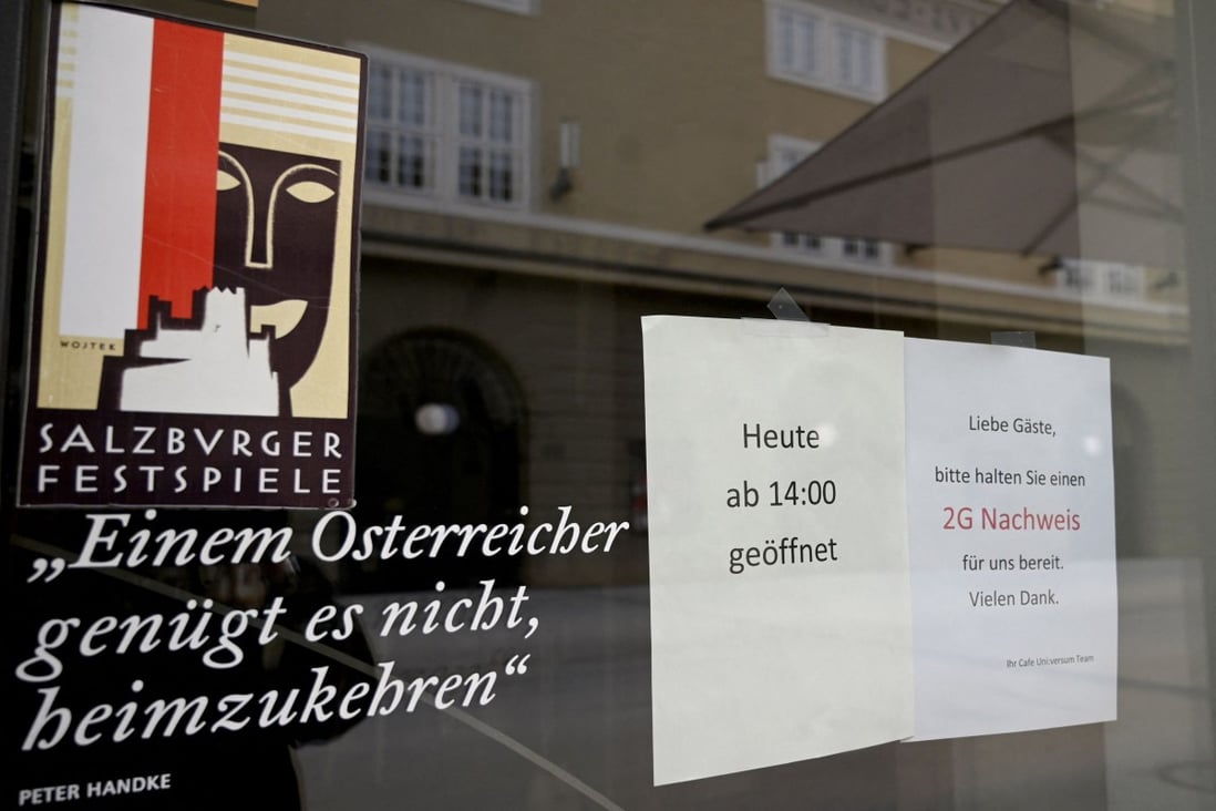 A sign for customers to be either vaccinated or recovered from Covid-19 in Salzburg, Austria, on November 12. Parts of the country are introducing a lockdown for the unvaccinated from Monday. A nationwide lockdown for those who have not had a jab may follow. Photo: AFP