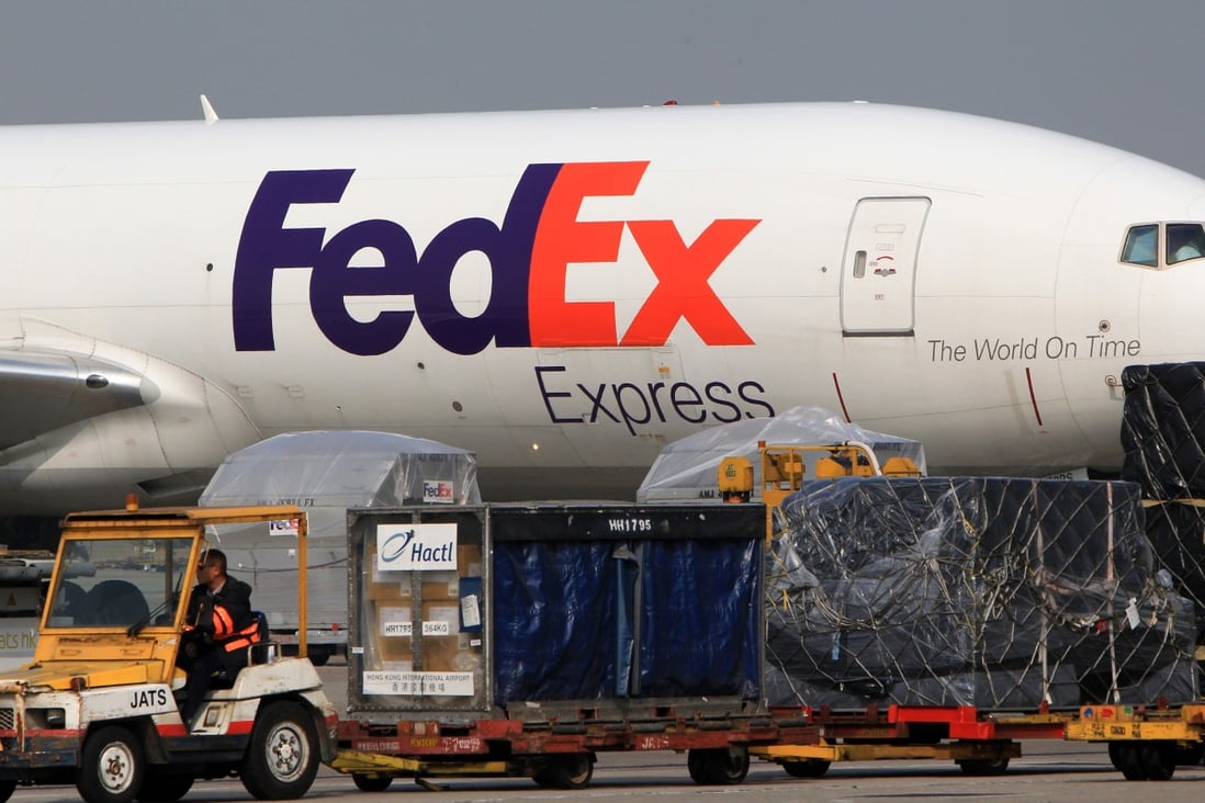 FedEx has cited the lack of a timeline for Hong Kong returning to normal in closing its local pilot base. Photo: Jonathan Wong