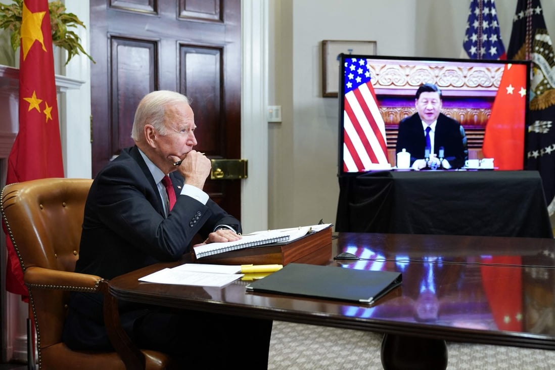 US President Joe Biden meets with China’s President Xi Jinping during a virtual summit from the Roosevelt Room of the White House in Washington on Monday. Photo: AFP