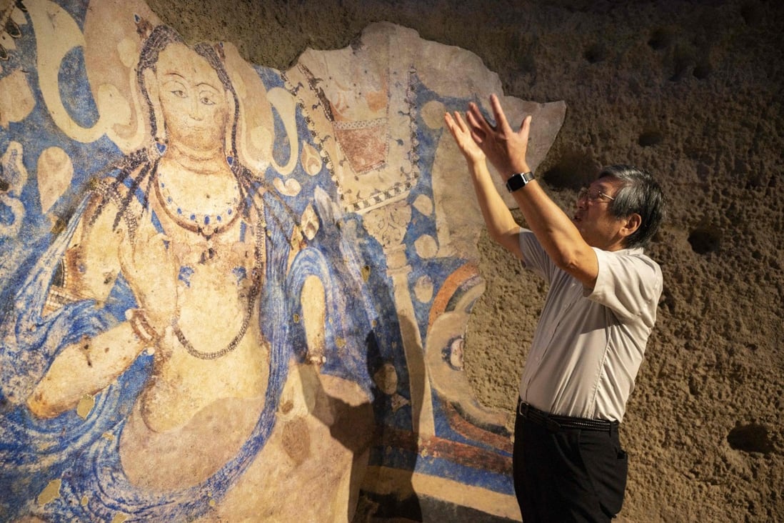A replica of a cave painting of a blue Bodhisattva, part of artefacts destroyed by the Taliban in 2001, on display at the Tokyo University of the Arts. Photo: AFP