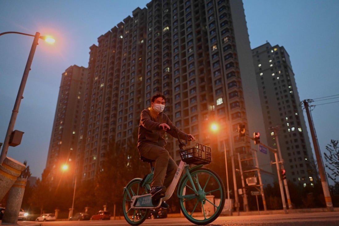 An Evergrande housing complex in Beijing. The company, China’s biggest developer, has bought itself more time by making last minute payments after a series of asset sales. Photo: AFP