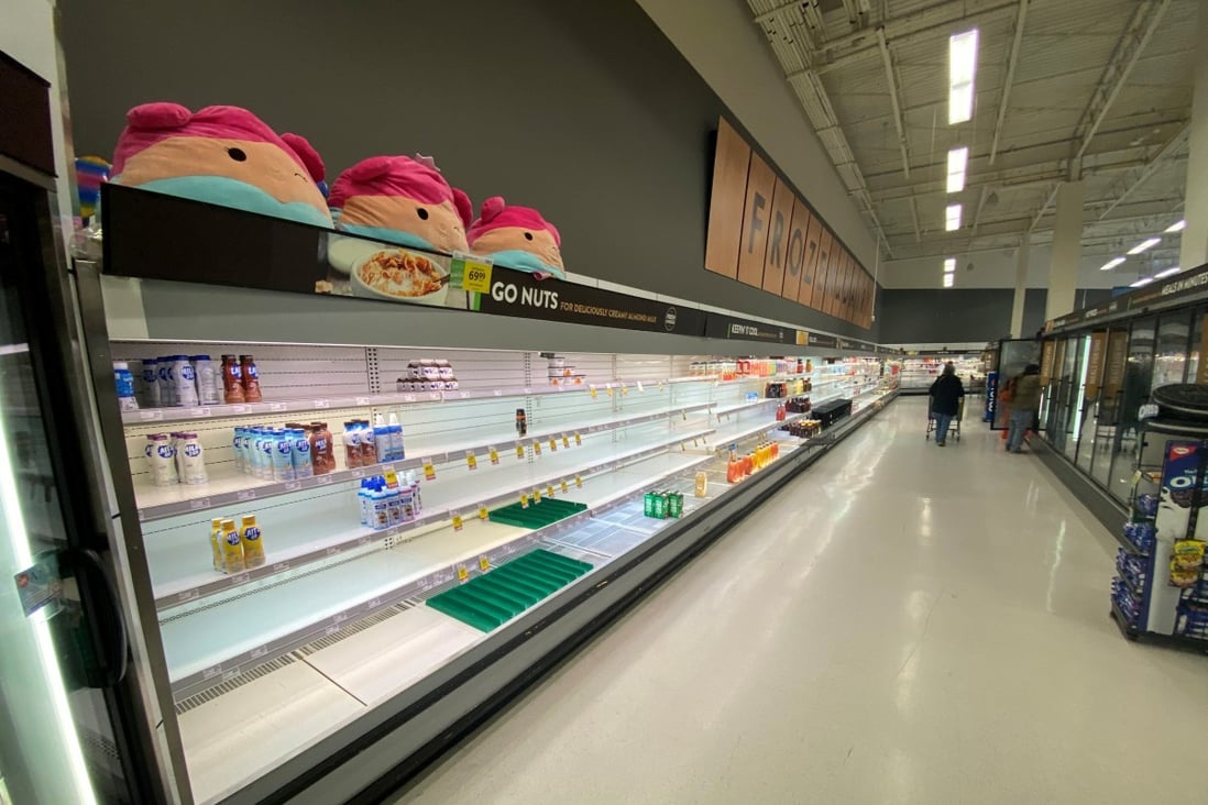 Panic buying in Canada's flood-hit British Columbia empties ...