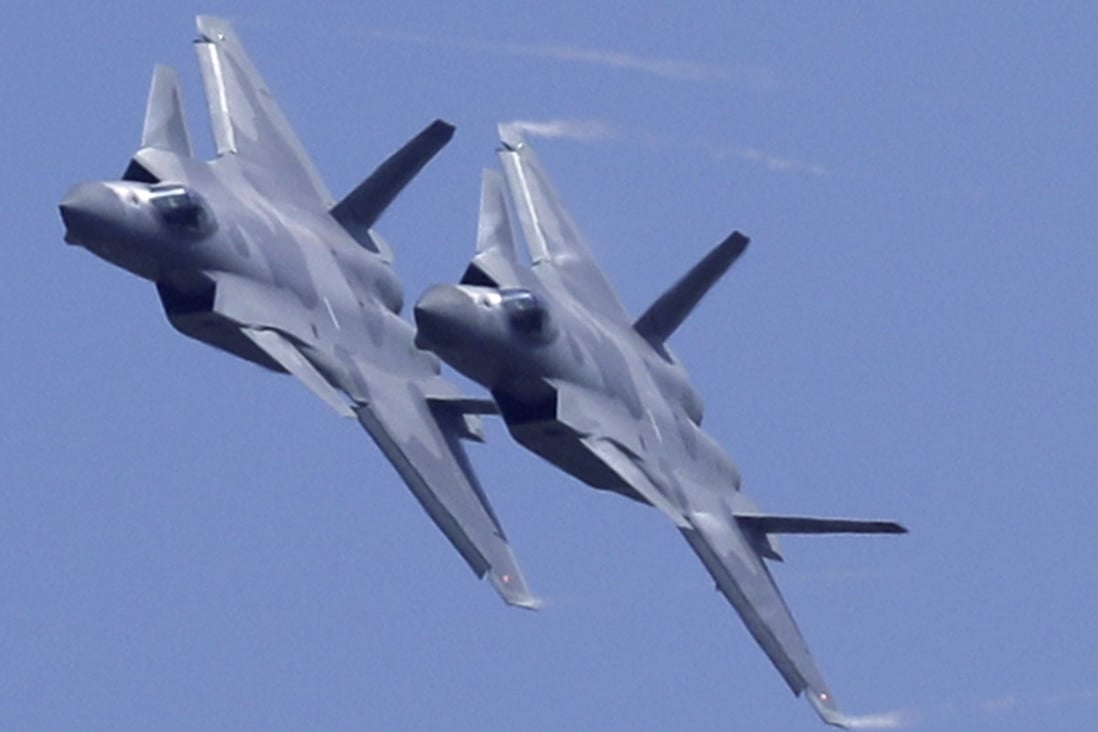 A PLA pilot has speculated on Chinese state media about a possible pairing of the J-20 stealth fighter with drones to improve the aircraft’s surveillance and warfare abilities. Photo: AP