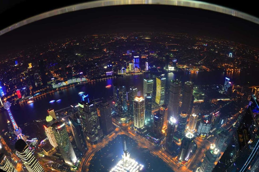 A fishbowl look of Shanghai’s skyline from the Shanghai tower as US-based NAI Global enters the city’s commercial real estate market. Photo: Xinhua