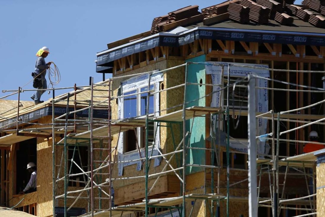 Existing home sales in the US bounced back in September and drew close to an eight-year high. Photo: Reuters