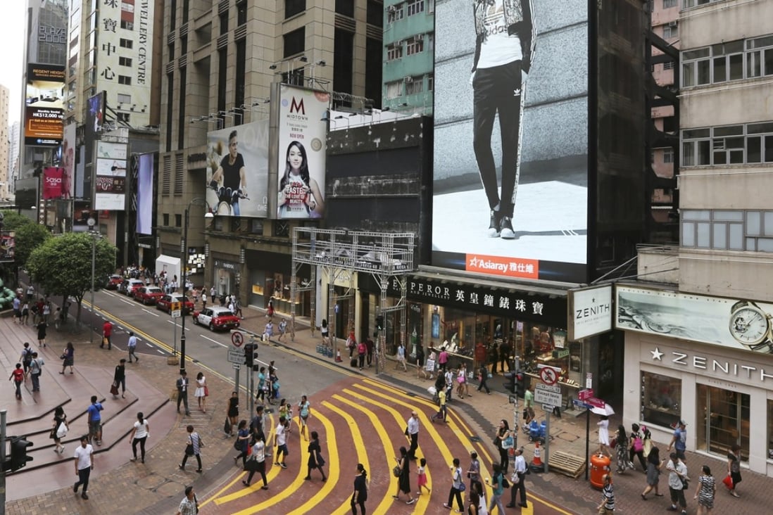 Luxury retailers line Russell Street in Causeway Bay. Photo: Sam Tsang