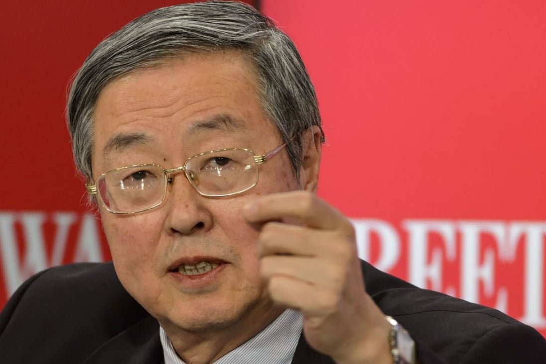 People’s Bank of China Governor Zhou Xiaochuan attends a session of the World Economic Forum (WEF) after his reported article on the Shenzhen-Hong Kong stock connect roiled the markets. The PBOC clarified the article came from excerpts of a speech delivered six months ago. Photo: AFP