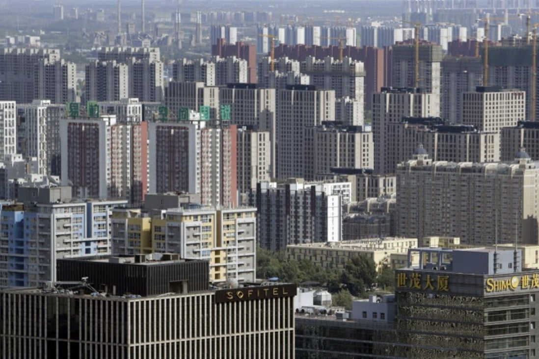 Apartment blocks and office buildings are pictured in Beijing as prices of new homes fall in October. Photo: Reuters