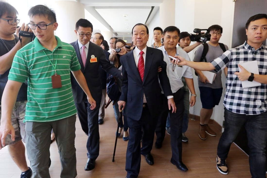 Former Heung Yee Kuk Chairman Lau Wong-fat (centre) attending a reception in June. Photo: Sam Tsang