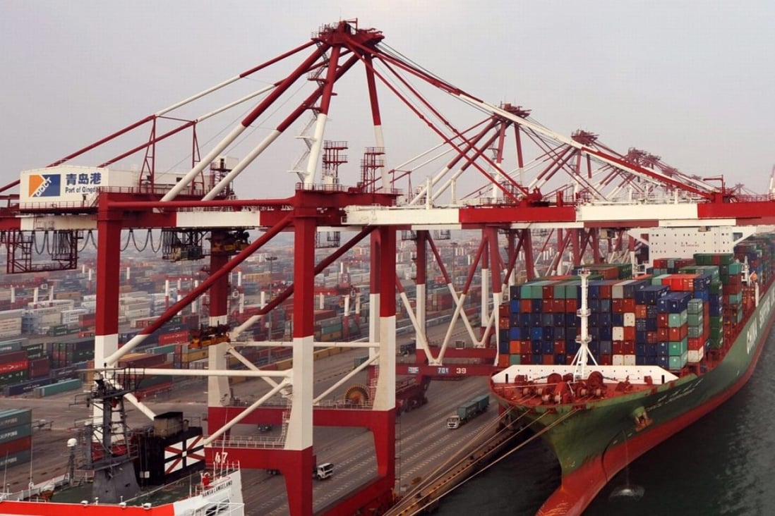 A container ship docks at the port in Qingdao, Shandong. As the Asia-Pacific region covers a broad spectrum of economies, regional economic integration should not and could not follow only one path. Photo: EPA