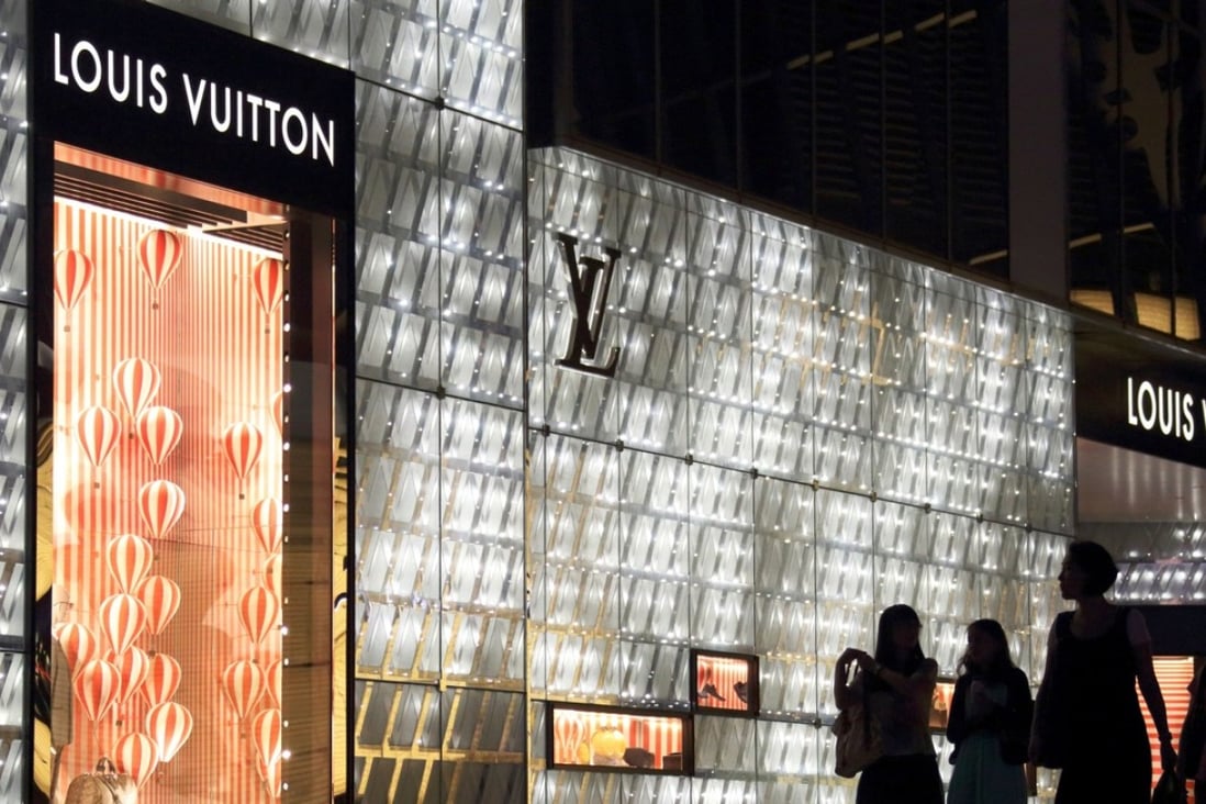 Louis Vuitton’s store in Shanghai. The French luxury retailer has closed outlets in Harbin, Urumqi and now Guangzhou, while opening a new one in Hangzhuo. Photo: Bloomberg.