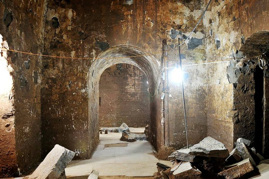 The looted interior of a nearly 1,800-year-old tomb near the city of Anyang in central Henan province which was found by Chinese archaeologists and is believed to have belonged to Cao Cao, who ruled the Kingdom of Wei from AD208 to AD220. The tomb was discovered about a year ago, but only became known to authorities after stone tablets carrying inscriptions of “King Wu of Wei” were seized from alleged tomb raiders. Photo: AFP