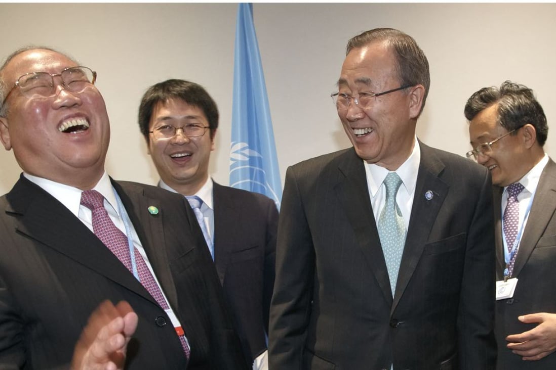 China's special representative on climate change Xie Zhenhua, left, shares a laugh with United Nations Secretary General Ban Ki-moon during the UN Climate Change Conference, in Le Bourget, north of Paris. Photo: AP
