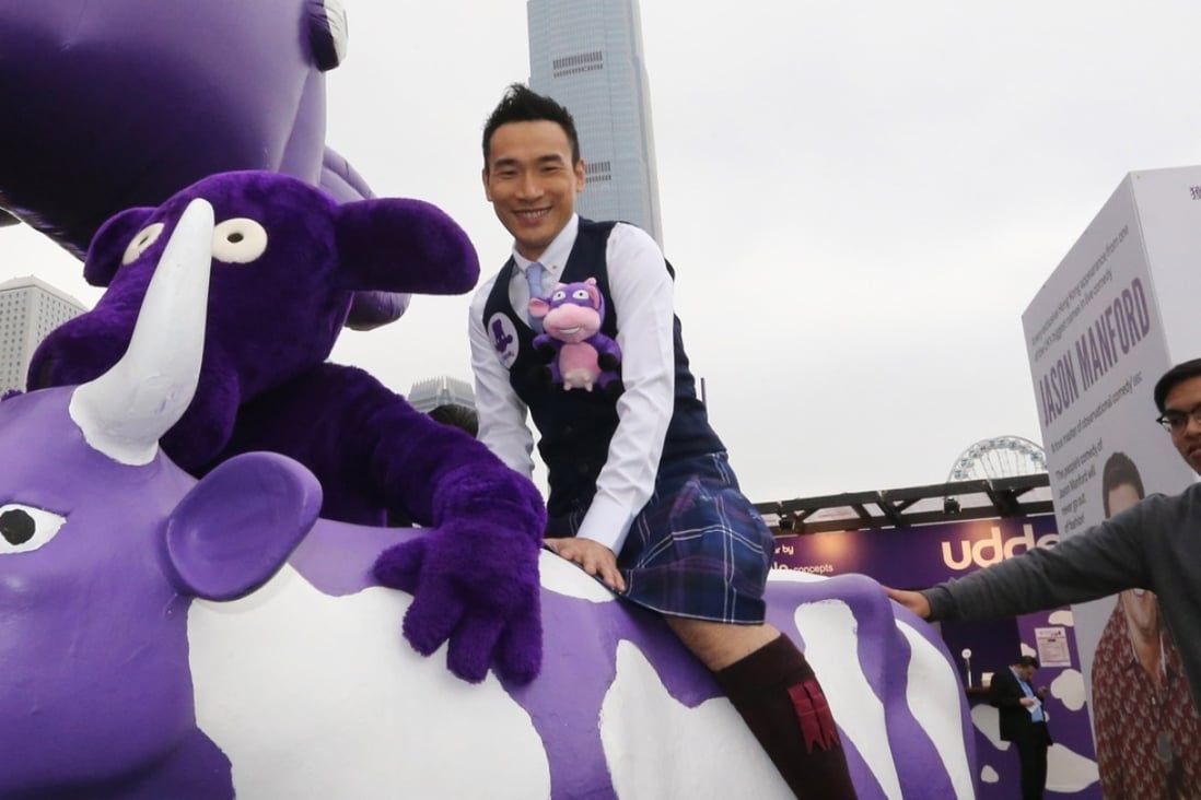 Tyson Chak aboard one of the purple cows at the Udderbelly Festival entrance in Central. Photos: Felix Wong