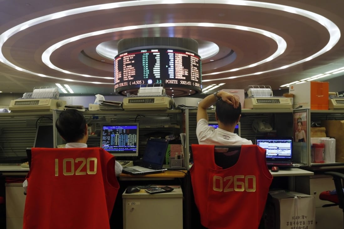 The trading floor of the Hong Kong stock exchange as business wound up by noon in a shortened session before the Christmas holiday. The market will be shut for Christmas and reopen on Monday. Photo: Reuters