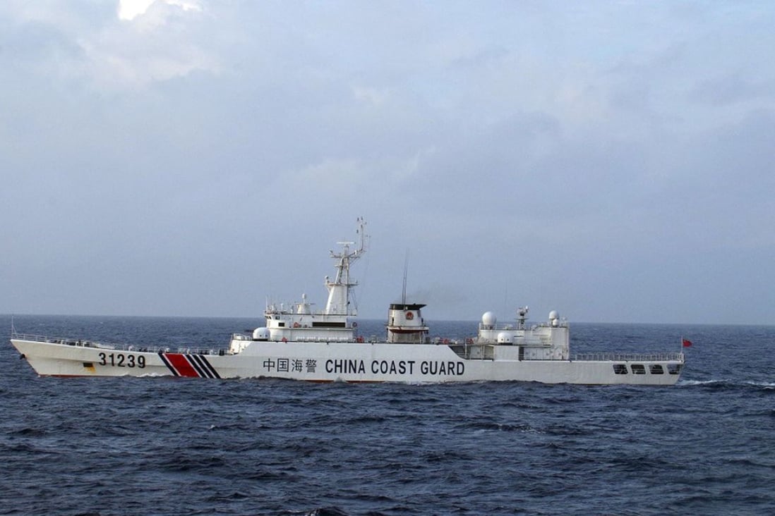 Japan Coast Guard photo of Chinese Coast Guard ship near disputed islets on December 22, 2015. Photo: AFP