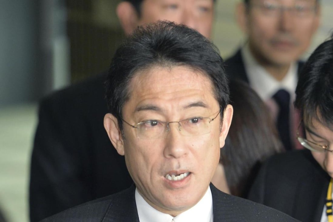 Japanese Foreign Minister Fumio Kishida meets with reporters at his ministry in Tokyo on December 25, 2015. Photo: Kyodo