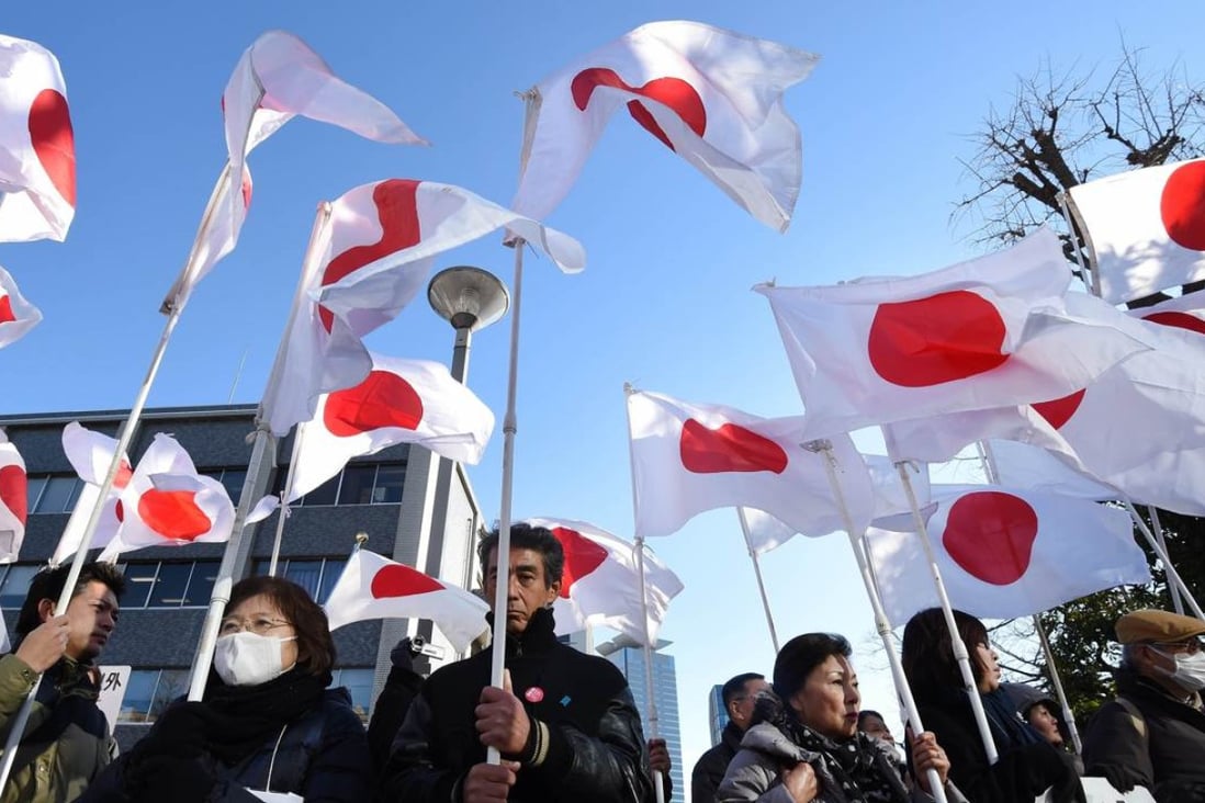 Japanese nationalists protest in front of the official residence of Prime Minister Shinzo Abe. Photo: AFP