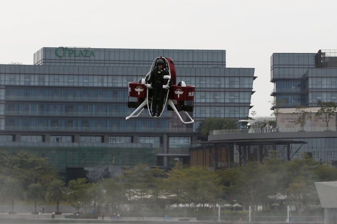 Michael Read, Director of Flight Operations from New Zealand-based Martin Aircraft Company, flies on a Martin Jetpack during a demonstration over a water park in Shenzhen on December 6. Photo: Reuters