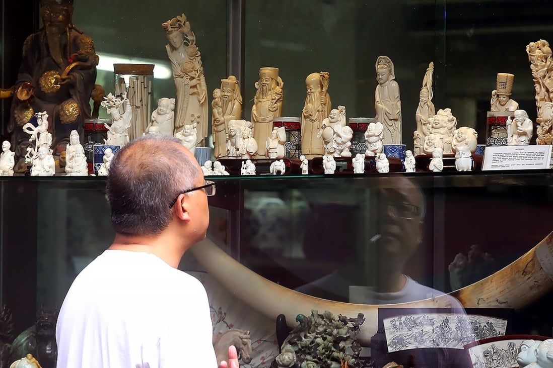 Ivory carvings and crafts are displayed in a shop on Hollywood Road. The operator’s future is now in doubt. Photo: SCMP Pictures