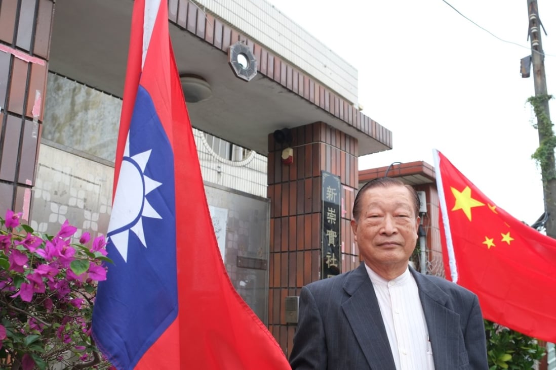 Chiang Wu, 76, a former naval captain, flies a inverted Taiwanese flag outside his house as a sign of his disillusionment with the island’s President Ma Ying-jeou. Photo: Minnie Chan