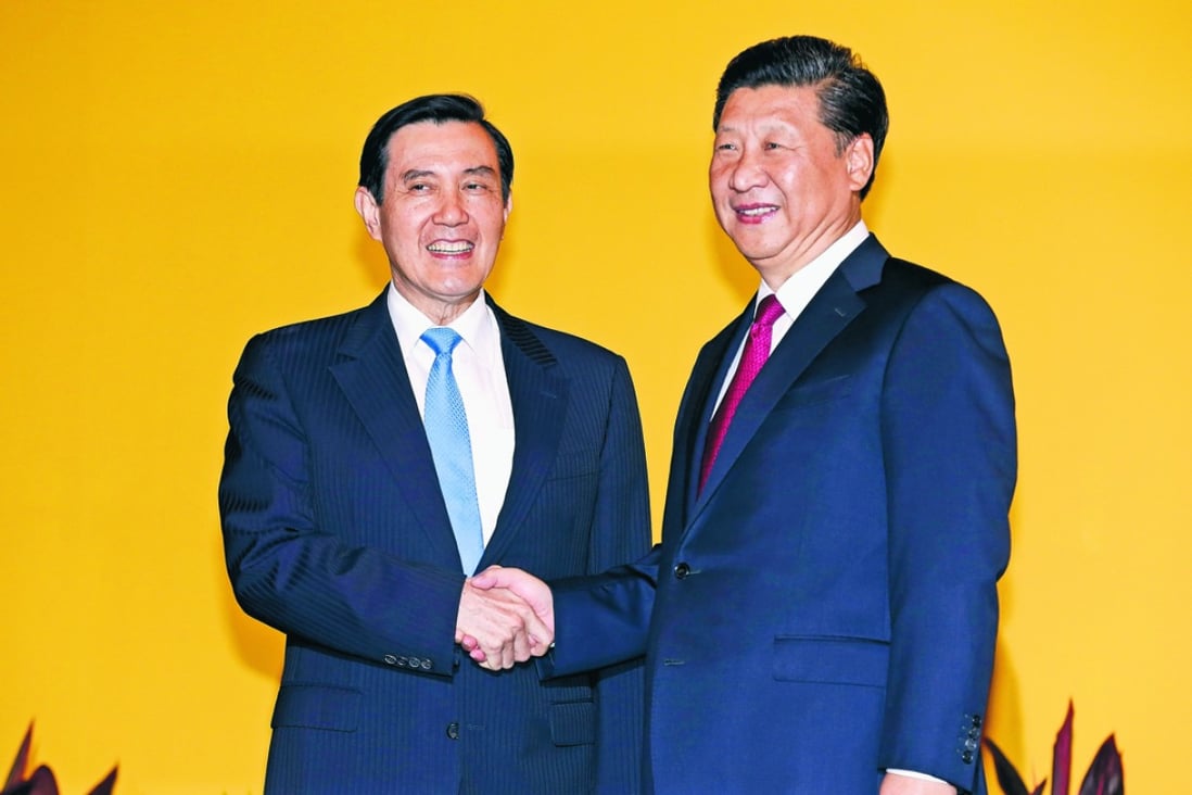 President Xi Jinping, right, and Taiwanese President Ma Ying-jeou, left, shake hands at their summit in Singapore in November. Photo: AP