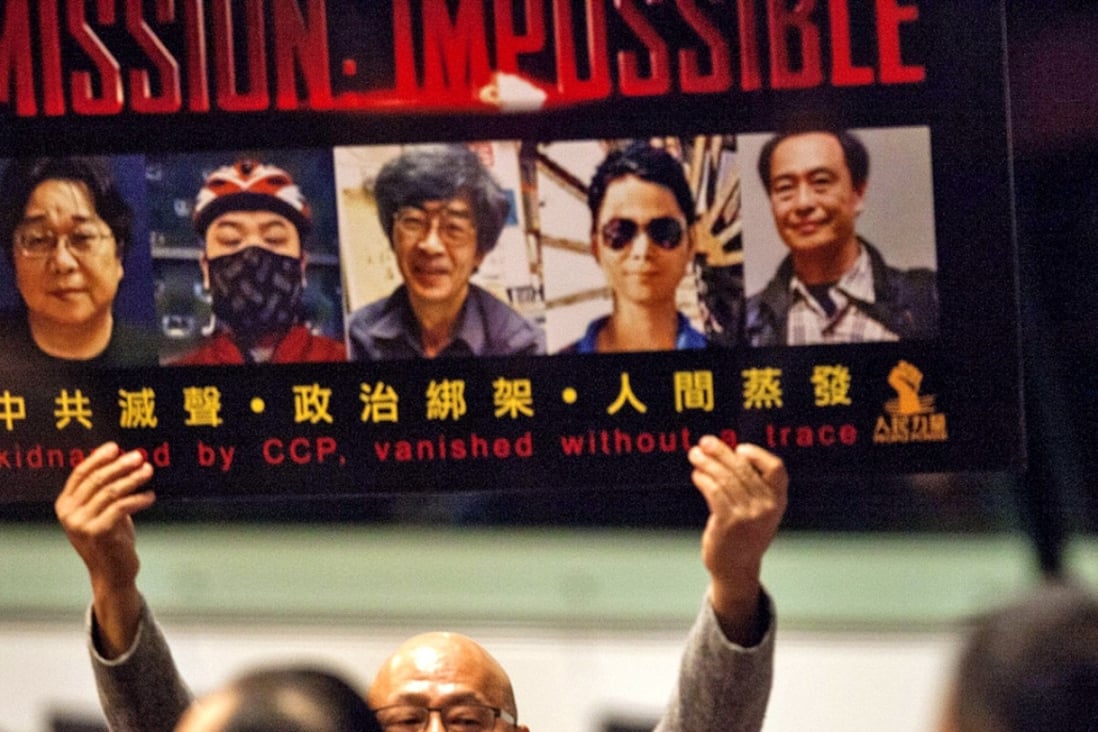 Lawmaker Albert Chan demanded the government clarify the whereabouts of the disappeared Hong Kong booksellers and shouted slogans at Leung Chun-ying Policy Address. Photo: EPA