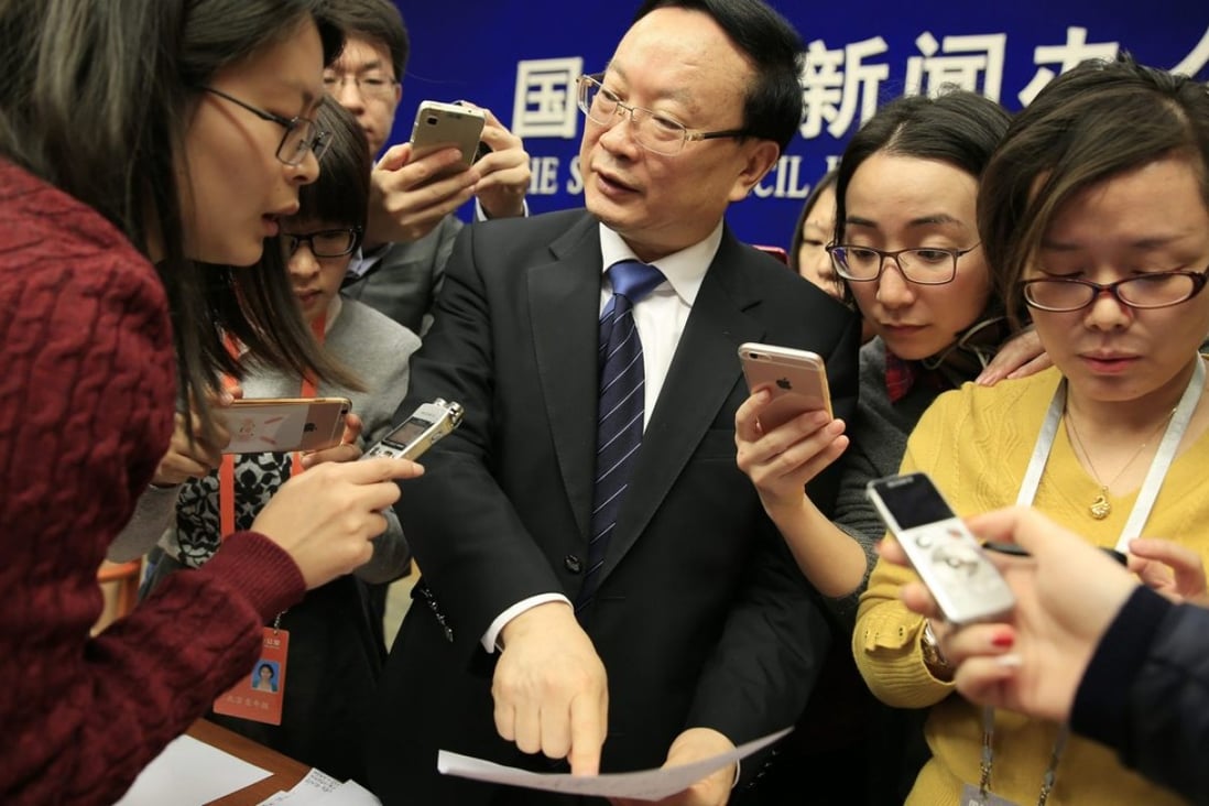 Wang Baoan, director of China’s National Bureau of Statistics, tries to make his point to reporters on Tuesday while announcing the nation’s latest gross domestic product figures. Photo: EPA