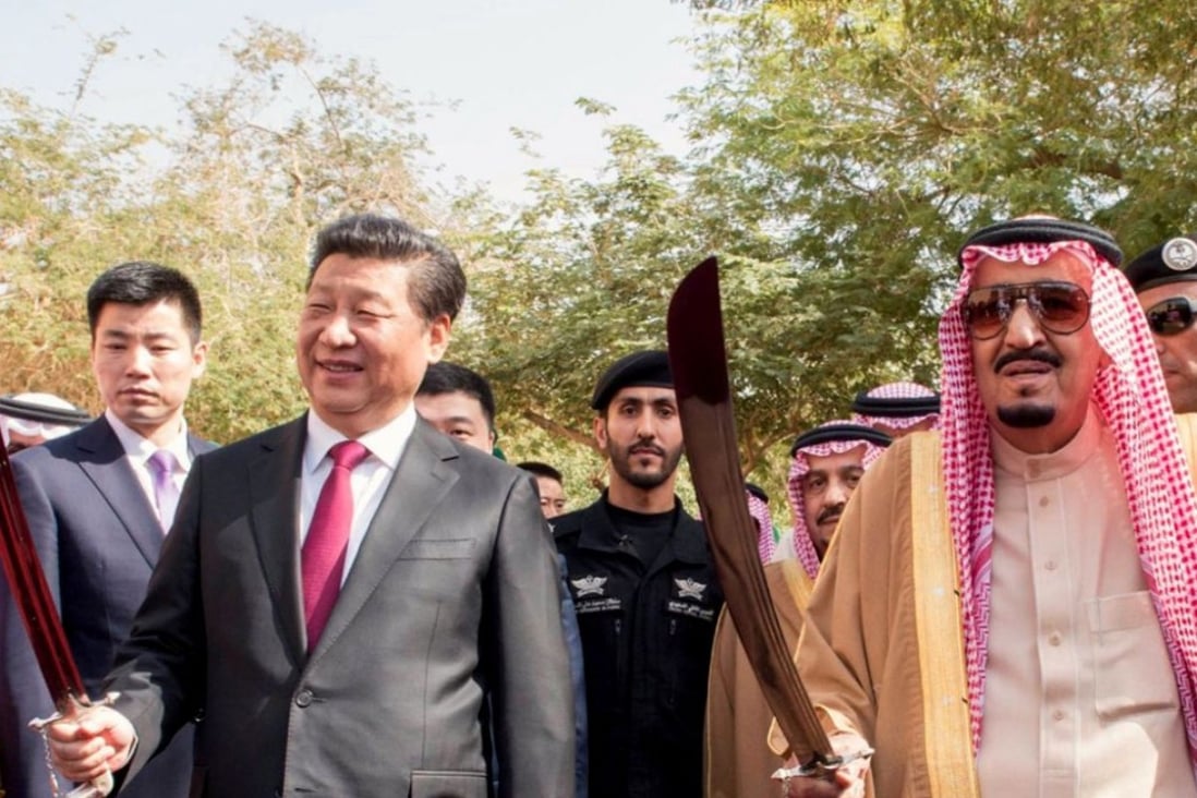 China’s President Xi Jinping (left) performs a traditional dance with swords with Saudi Arabia’s King Salman bin Abdulaziz as part of a welcoming ceremony for him in Riyadh on Thursday, during his trip to the Middle East. Photo: AFP