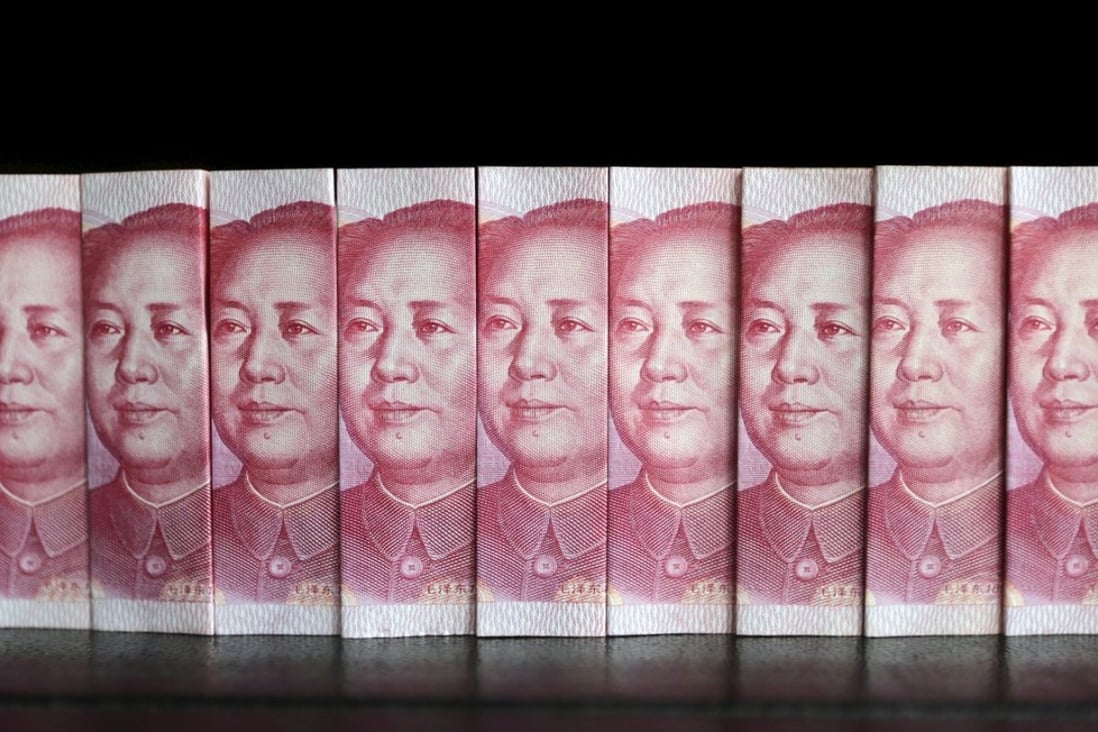 100 yuan banknotes. Photo: Reuters