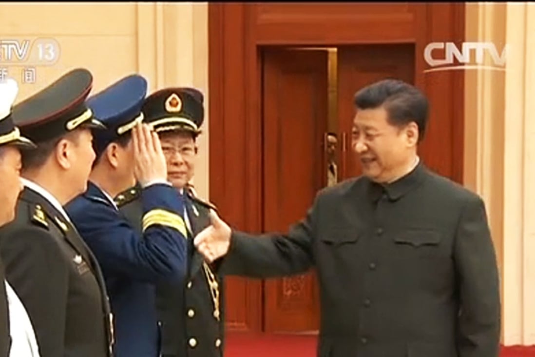 Central Military Commission chairman Xi Jinping greets senior officers from the PLA Navy, Army and Air Force. Photo: CCTV News