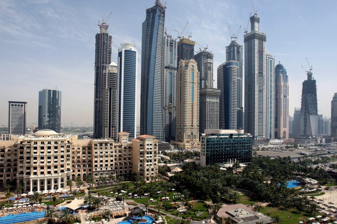 View of luxury hotels and skyscrapers in Dubai. The strength of the US dollar, to which the dirham is linked, has also hurt demand from Dubai’s traditional customers in Europe and Russia. Photo: EPA