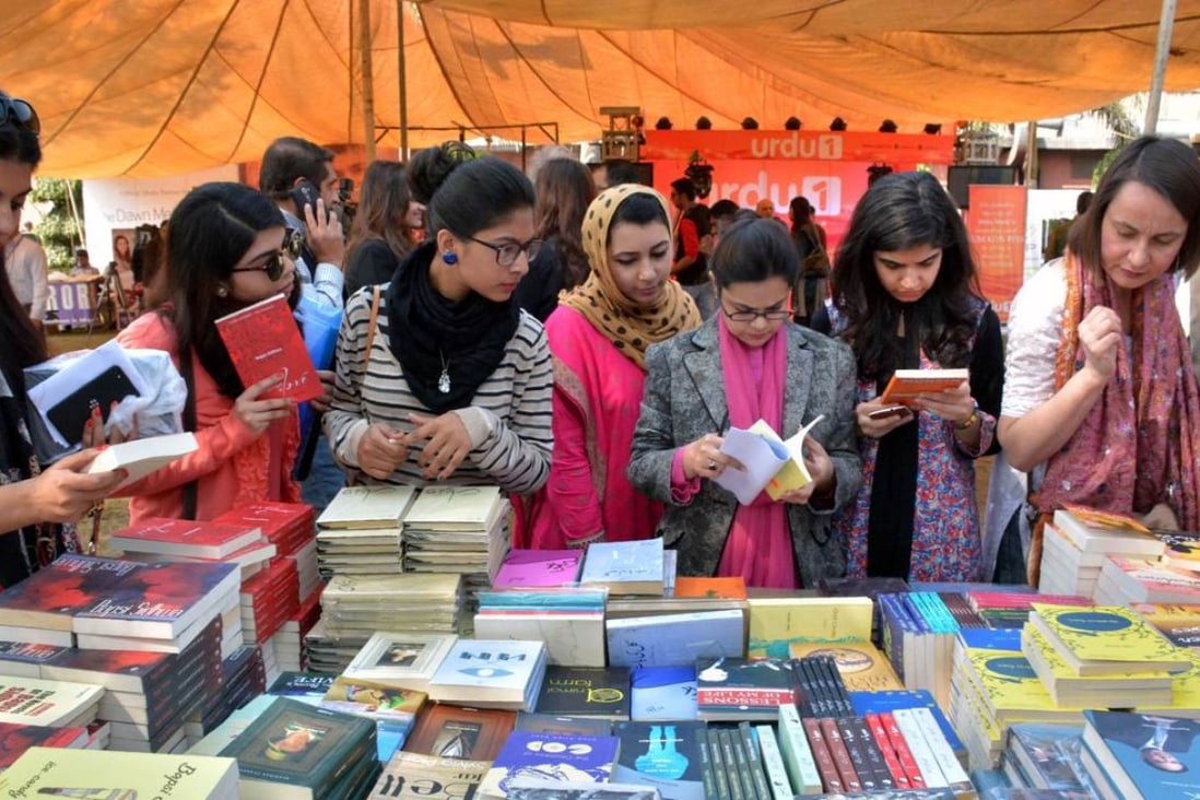 Pakistani women browse books at the Lahore Literary Festival. Photos: Ahmed Riaz