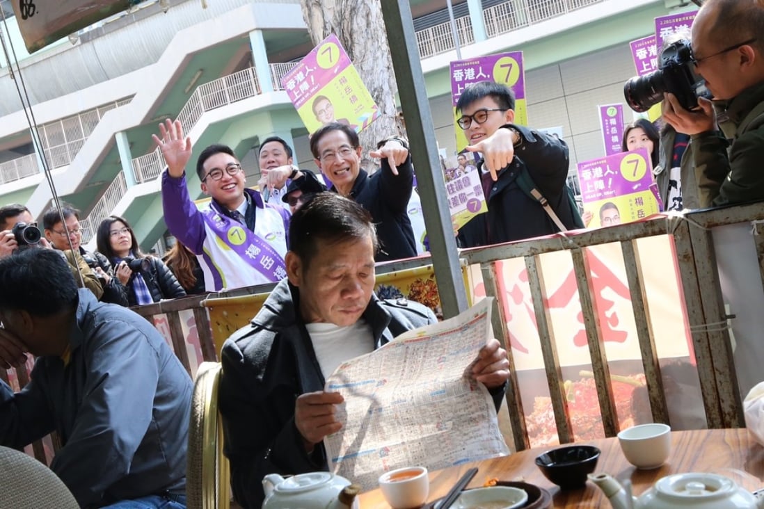 Straining to get the attention of every voter in the New Territories East by-election. Photo: SCMP Pictures