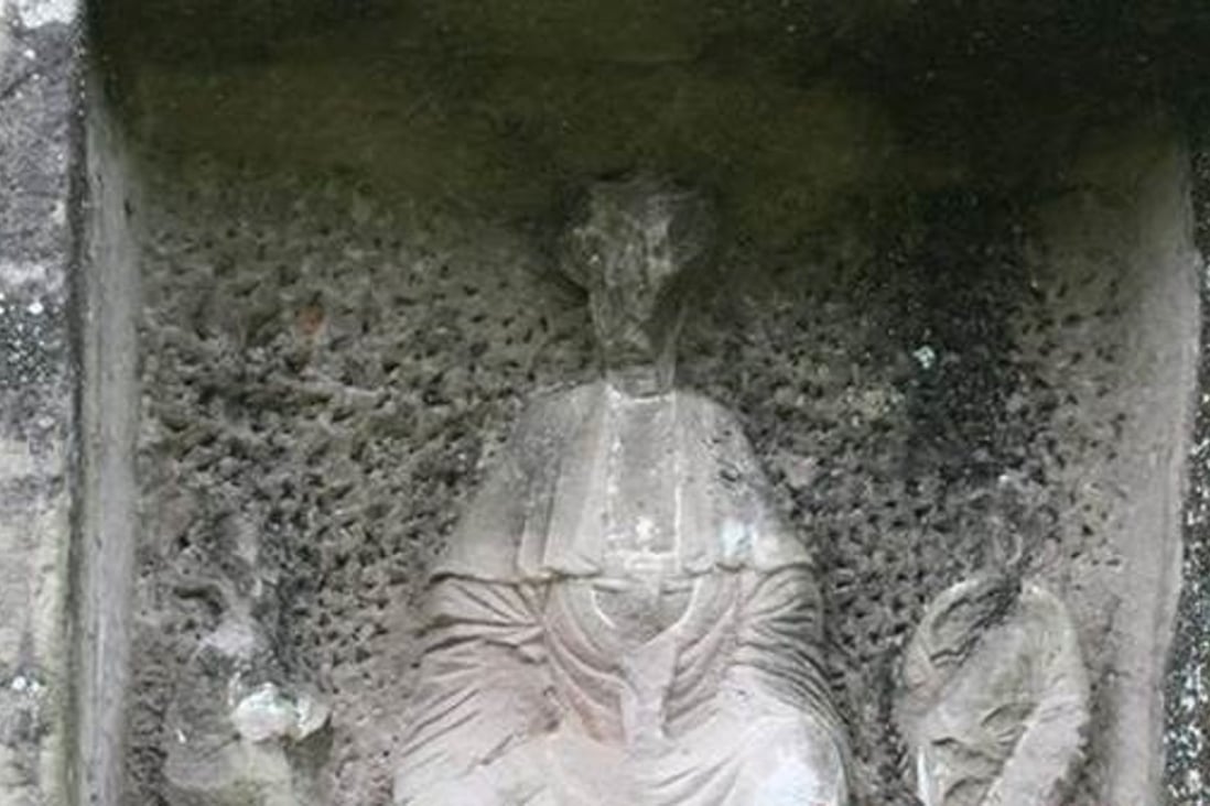 An example of the damaged Buddhist images on the giant boulder. Photo: Newssc.org.