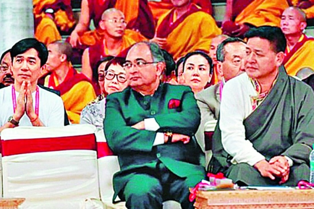 Tony Leung (far left) and Faye Wong (behind) pictured at a Buddhist gathering in India. Photo: SCMP Pictures