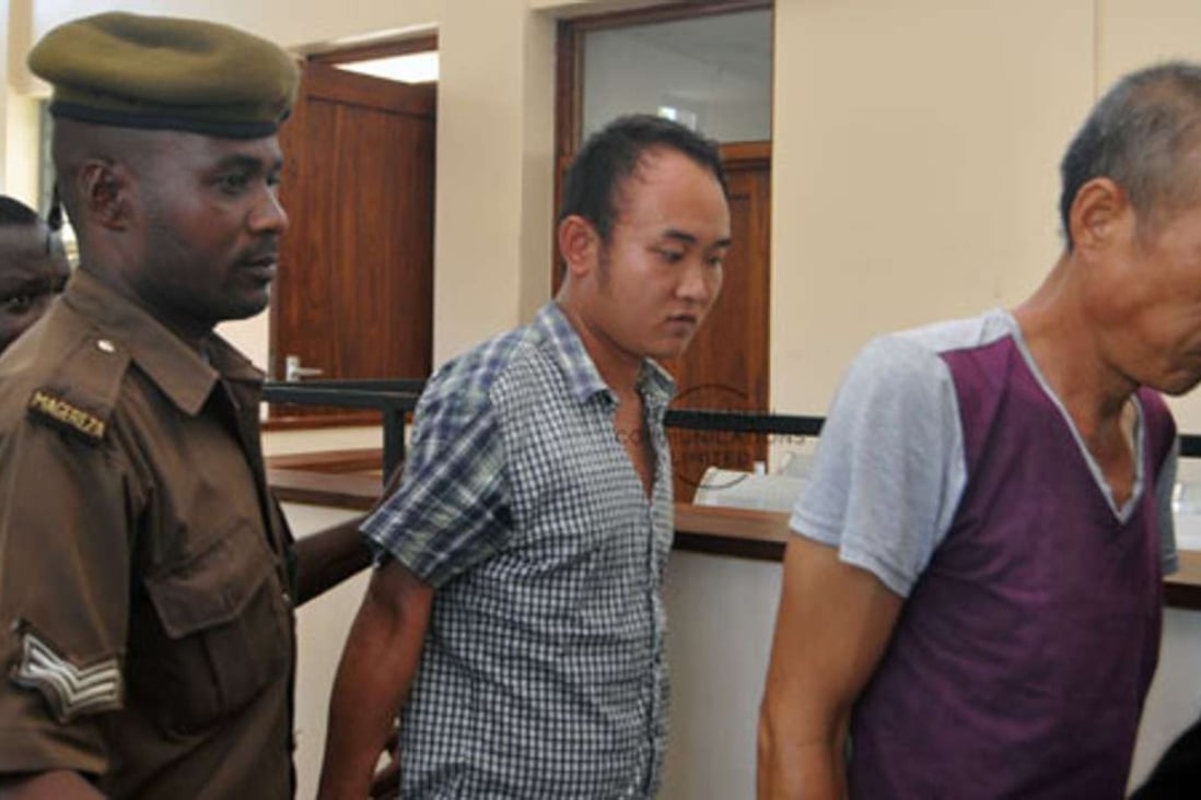 The two smugglers jailed in Tanzania. Photo: Xinhua