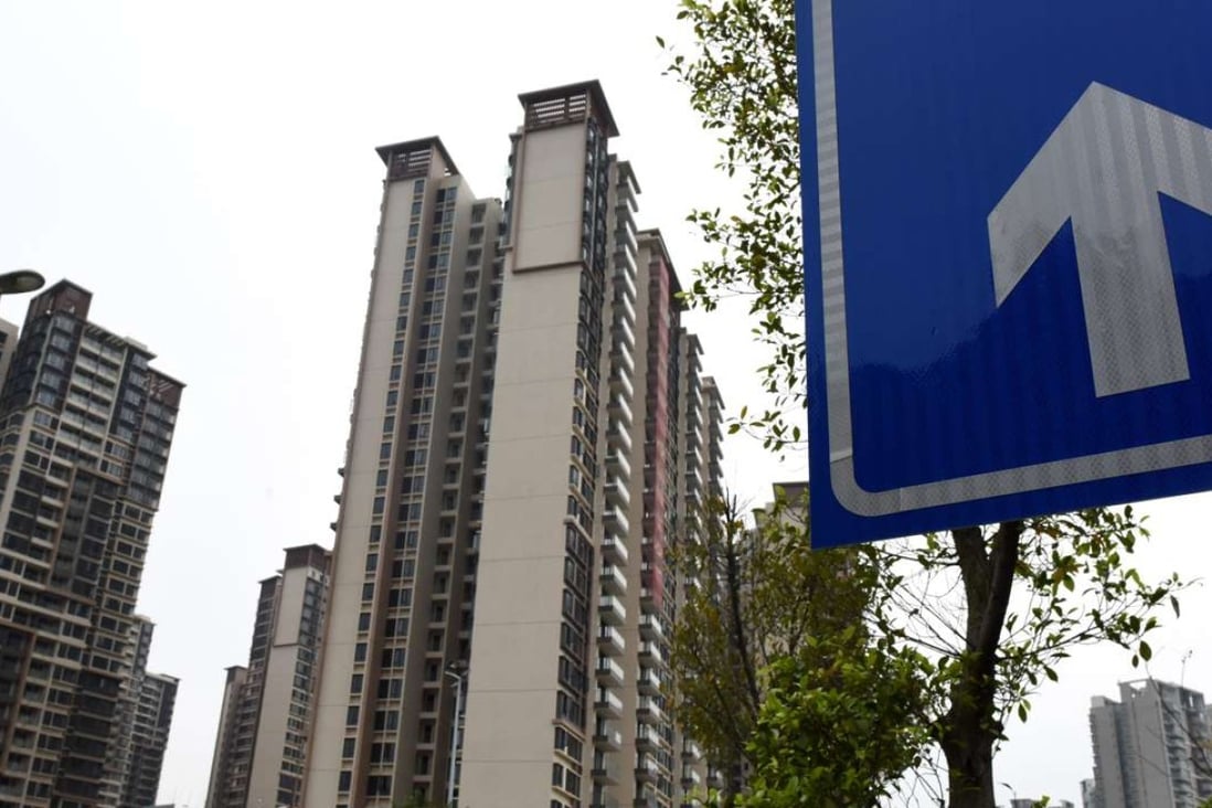 Residential buildings for sale in Guangzhou. China's housing market continued to warm in February, with more than half of surveyed major cities reporting month-on-month rises in new home prices. Photo: Xinhua