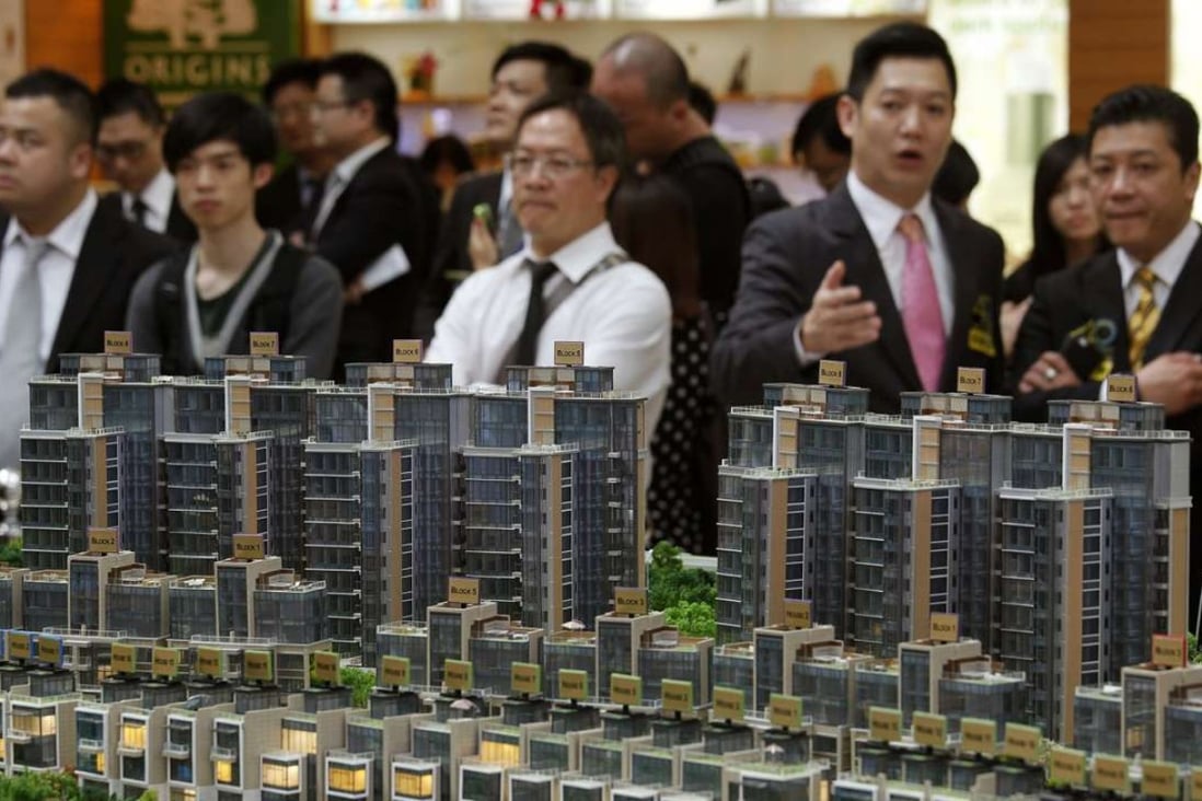 Sun Hung Kai Properties and New World Development have only reached 35 per cent and 28 per cent respectively in their annual sales target. Photo: Reuters