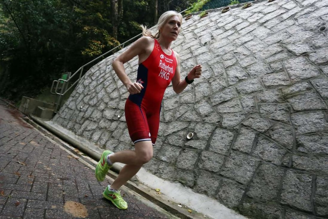 Triathlete Kate Rutherford, a mother of two who will represent Hong Kong for the first time at the age of 43, on a training run at Bowen Road Park on Bowen Road. Photo: SCMP Pictures/Jonathan Wong