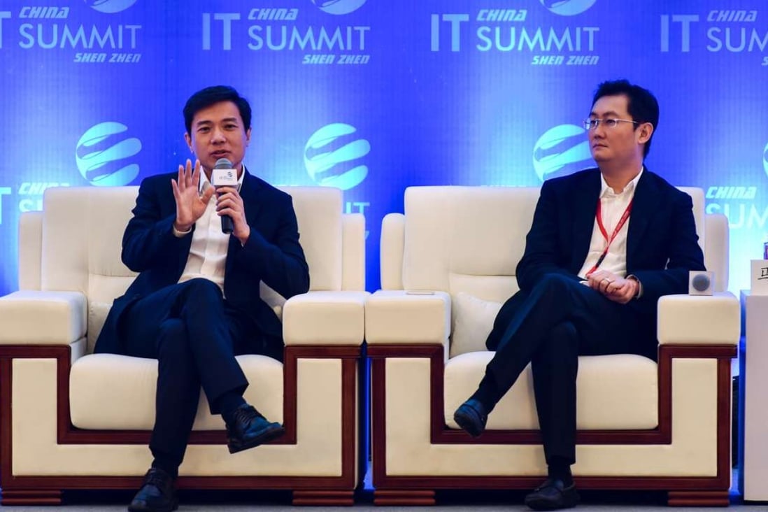 Tencent founder and CEO Pony Ma (right) and Baidu CEO Li Yanhong attend the China (Shenzhen) IT Summit on Sunday. Photo: Xinhua