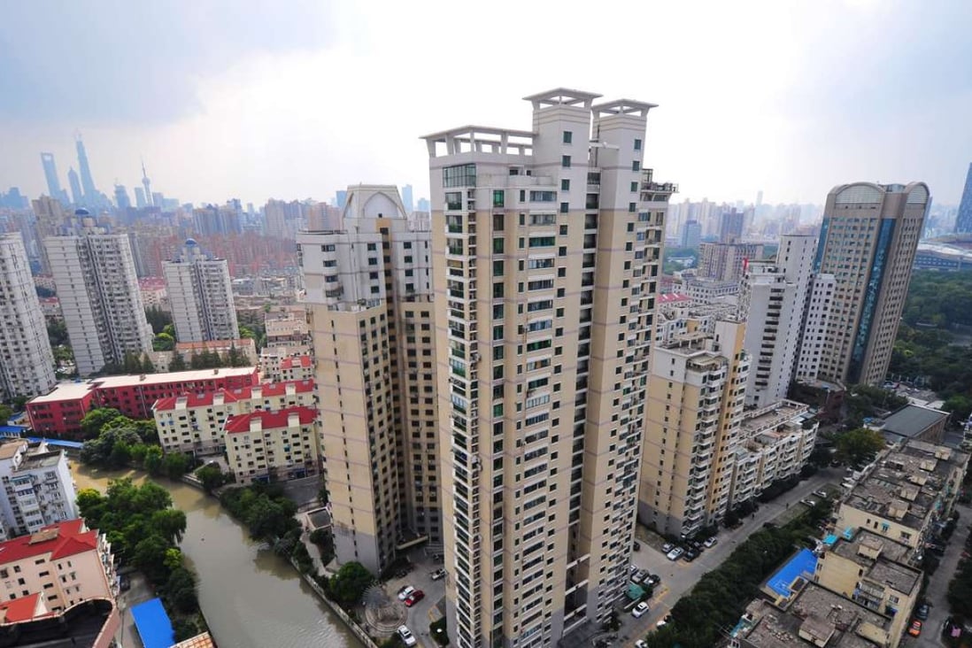 Shanghai home sales measured by floor area fell to 59,200 square metres overnight on Saturday, a day after new local government cooling policies were announced. Photo: Xinhua