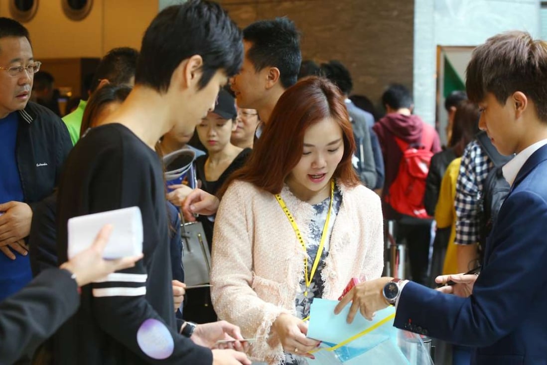 Potential home buyers gather during the sales of Sun Hung Kai's Ocean Wings at International Commerce Centre in West Kowloon. Photo: Edmond So