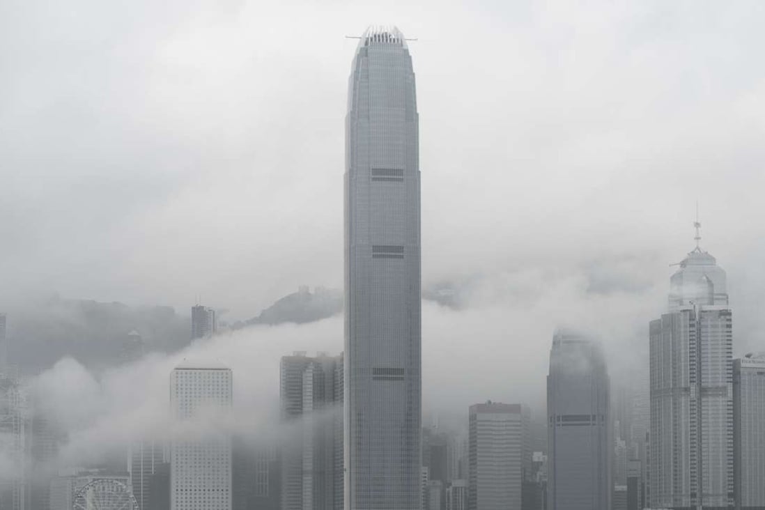 Hong Kong skyline shrouded in fog. Photo: AFP